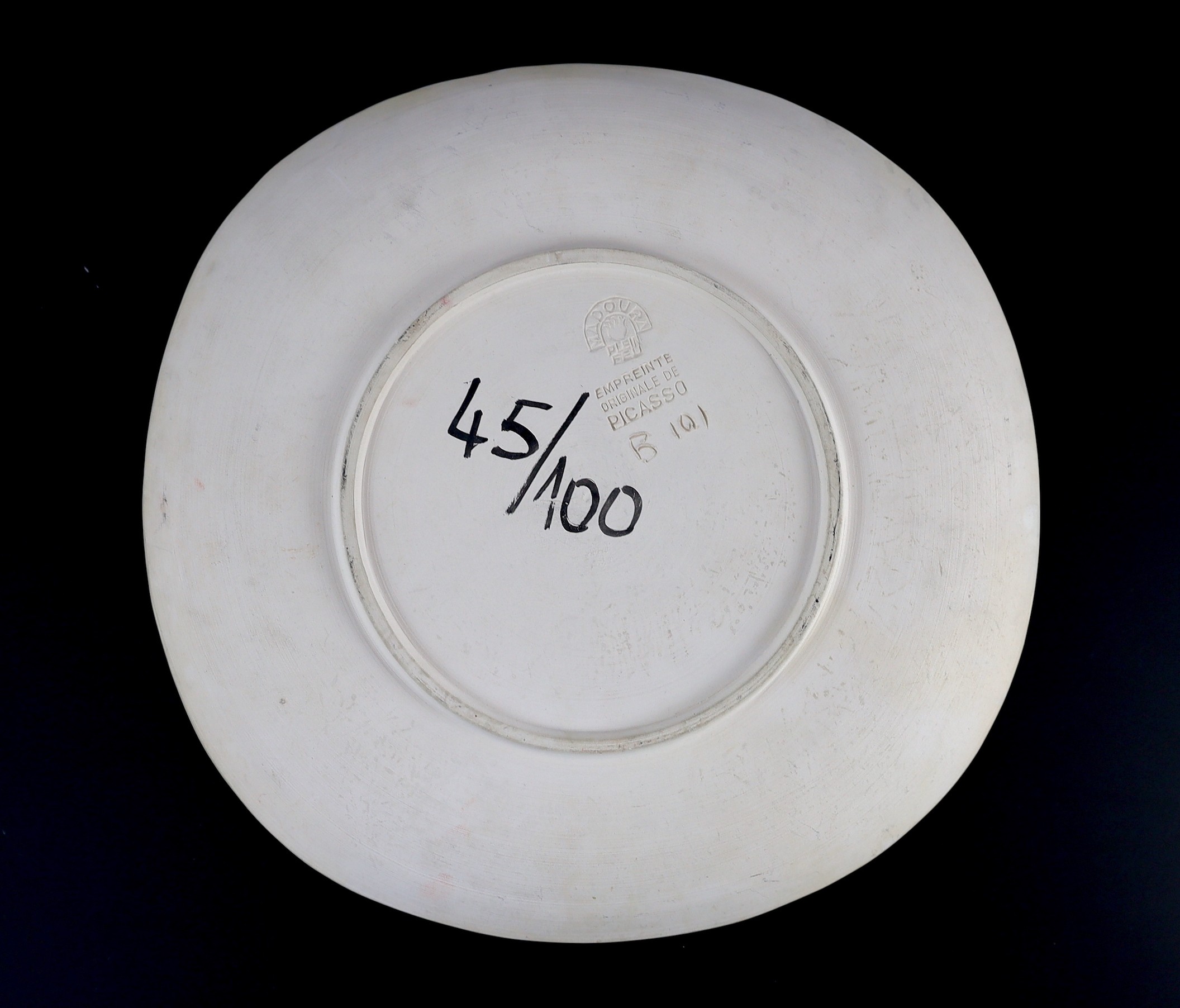 Pablo Picasso (1881-1873) for Madoura Pottery, 'B101', Joueur de diaule et faune dish (A.R. 342), 31.5cm wide